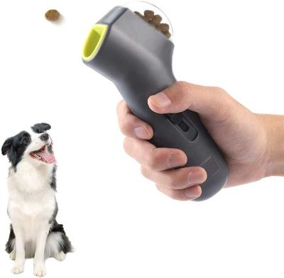 China Funny Training Launcher Dog Treat Launcher Pet Food Snack Dispenser Food Driver for sale