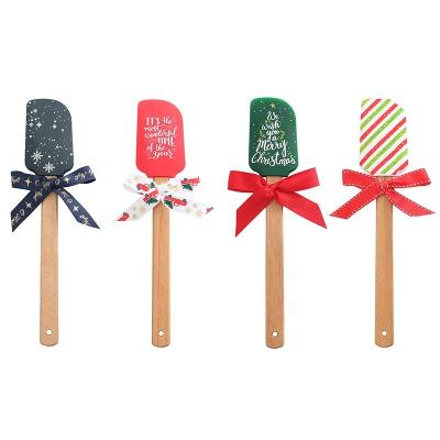 China Unique Design 2pcs Silicone Christmas Baking Set Printing Spatula and Cookie Cutter Set Viable Hot Selling Baking Tool for sale