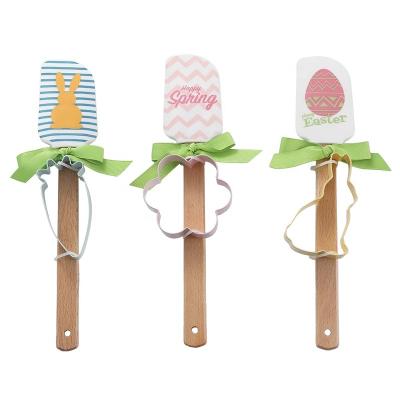 China Unique Design Viable In Stock 2pcs Silicone Set Easter Spatula And Cookie Baking Cutter Set With Ribbon Bunny Flower Carrot for sale