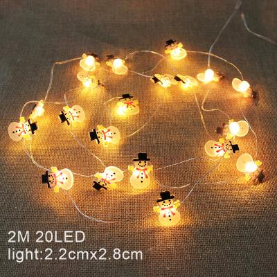 China Rubber+PVC Led Christmas Lights String Santa Claus Black Hat Snowman Deer Head Decoration Lights Copper Wire Lights for sale