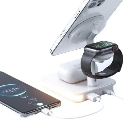 China Fast Charger Mag4 in 1 Magnetic Fast Charger Stand 15W Qi Wireless Charger Holder with LED Light for sale