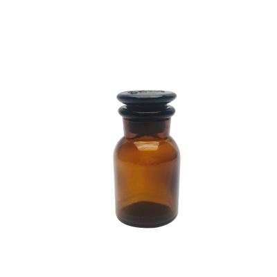 China Eco-freindly 60ml Small Color Amber Medical Apothecary Decoration Reagent Bottle Glass Jar for sale