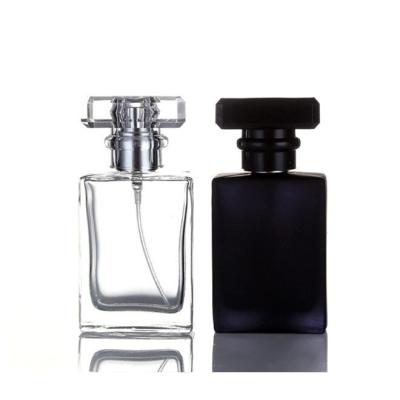 China 30ml 50ml 100ml Glass Flat Square Perfume Bottle Black Stock Color With Spray for sale