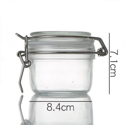 China 150ml 5oz Metal Stocked Clip Hold Top Small Glass Jars For Storage Food Containers Wholesale for sale