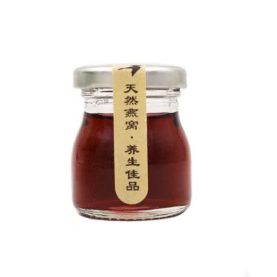 China Stocked promotion 50ml mini bird's nest honey jam nut clear glass jar with lid wholesale for sale