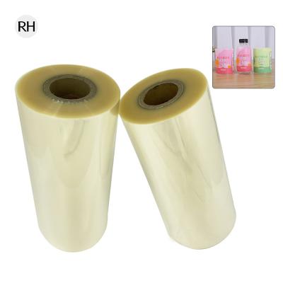 China Beverage Sleeve Printing PVC Shrink Film Roll Labels Wrap Around Sleeve Beverage Heat Shrink Clear Plastic Film for sale