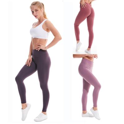 China Antibacterial yoga pants lift up sports women fitness tights with high pocket waist yoga gaiters dropshipping for sale