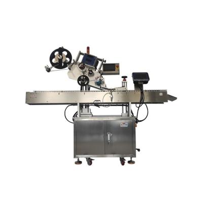 China Cheap Automatic Horizontal Wine Vial Food Adhesive Sticker Labeling Machine For Round Bottle for sale