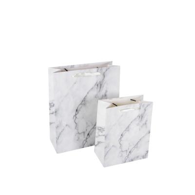 China New Design Luxury Recyclable Marble Printed Gift Bag With Ribbon Handles Custom Logo Paper Shopping Bag for sale