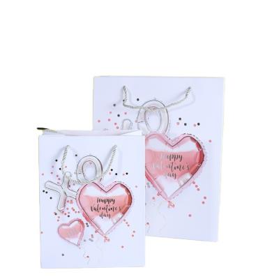 China KAIBO 2022 custom logo valentines day heart rose gift bags flower printing foil bags jewelry handmade luxury paper bags boutiques for sale