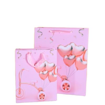 China KAIBO 2022 New Heart Style Luxury Valentines Day Gift Bags Shopping Handmade Pink Paper Package Bags for sale