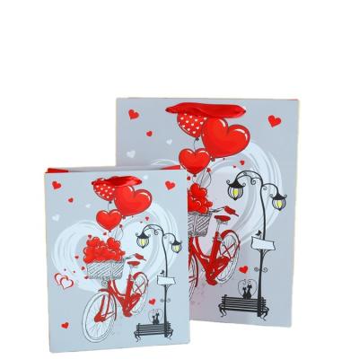 China Wholesale 2022 Valentines Day Eco Handmade Gift Bags Red Flower Balloon Heart Luxury Wedding Paper Gift Bags for sale