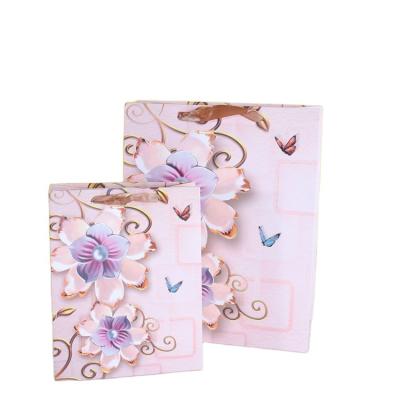 China Wholesale handmade boutique luxury silver paper bags jewelry gift theme flower theme flower KAIBO custom logo for sale