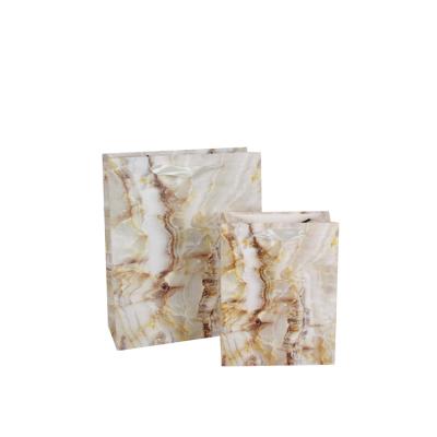 China Custom Hot Selling Logo Packaging Drawstring Paper Bag Recyclable Marbling Gift Fancy Marble Paper Bag for sale