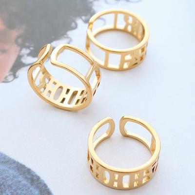 China Fashion TRENDY Hollow Letter HipHop Women Punk Jewelry 18K Gold Plated Stainless Steel Open Ring for sale