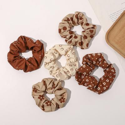 China Fashion Gut Ring Milk Tea Custom Hair Scrunchies 15 Colors Printing Fabric Scrunchies for sale