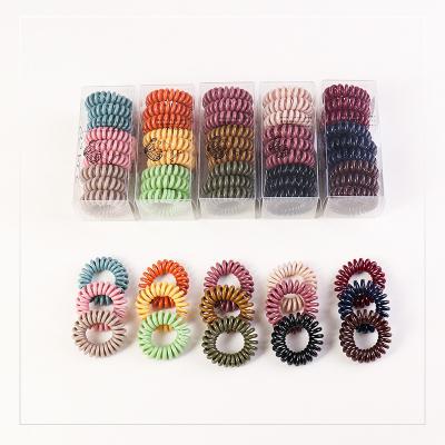 China Fashionable Phone Rope Hair Tie Plastic Scrunchies Coil Hair Tie Set Box Hair Accessories For Women for sale