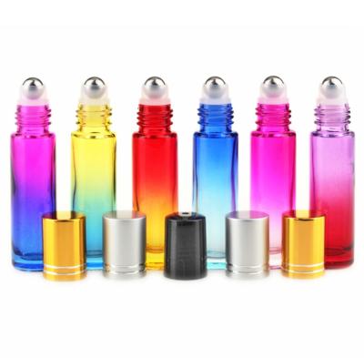 China Personal Care 10ml Gradient Glass Essential Oil Roll On Roller Bottle With Gold Lid for sale