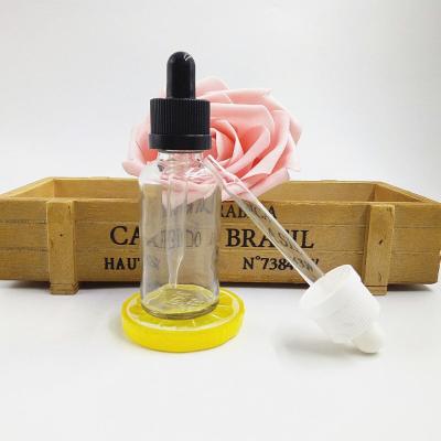 China E Liquid Most Fashionable Clear 30ml Round Glass Dropper Bottle With Kid Safe Cap for sale