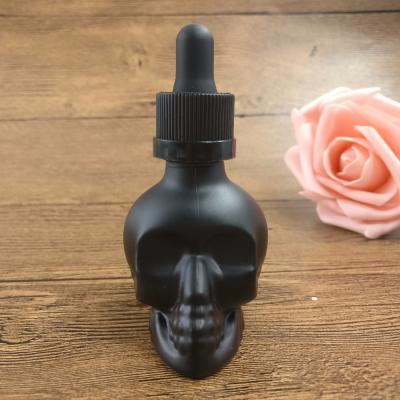 China E Liquid 1oz Skull 30ml Beard Oil Glass Bottle Child Safe Lids for sale