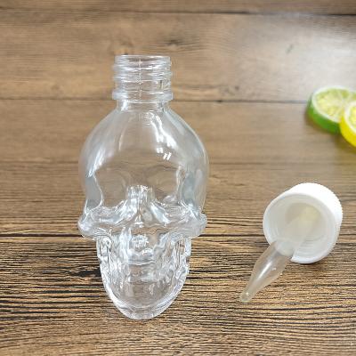 China Clear Cap 30ml Glass Eye Dropper Skull Bottle Safe For Kids E Liquid for sale