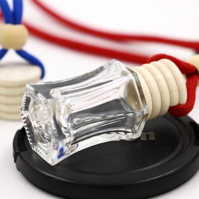 China Gift & Clear Round Craft 6ml Wooden Arming Rope Cap Glass Car Perfume Bottle for sale