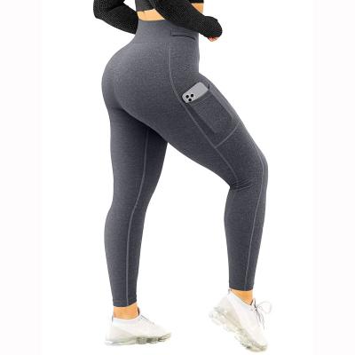 China Breathable High Waist Yoga Pants Loose Scruch Sports Workout Gaiters Women Yoga Pants With Pocket for sale