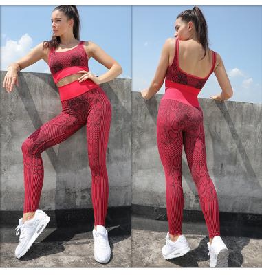 China Breathable Snake Print Seamless Tracksuit U Neck Sports Bra Stripe Leggings Women Yoga Pants Workout Set for sale