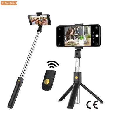 China Portable Foldable Mobile Phone Wireless Bluetooth Selfie Stick Built-in Video Bracket Alloy Stativ Multifunctional Bracket U07 Tripod Selfie Stick for sale