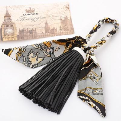 China Popular Leather Bag Souvenir Gifts Promotion Pu Tassel Key Chain Pendant Accessories for sale