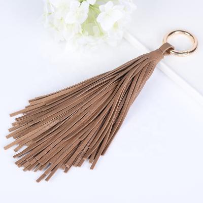 China Leather Tassel Trending Souvenir Gifts Promotion 2022 Fashion Bag Accessories Key Ring Keychains New for sale