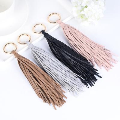 China Hot PU Leather Ladies Souvenir Gifts Promotion Sales Cute Tassel Keyring Keychains For Bags for sale