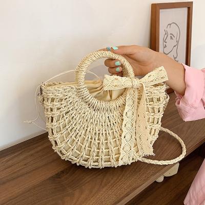 China Fashion New Fashion Straw Beach Bags Ladies Tote Travel Wild Holiday Woven Handbag for sale