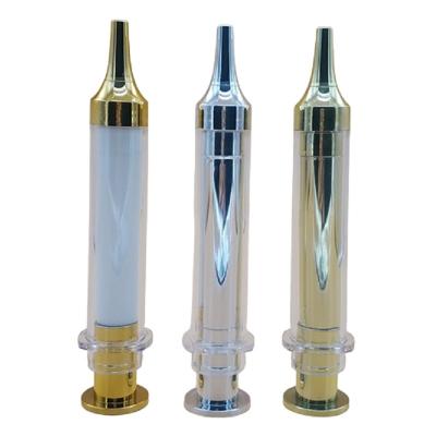 China Syringe Shape Vacuum Bottle 10ML Gold Silver Cosmetics Essence Serum Hyaluronic Acid Packaging Empty Plastic PETG Syringe Airless Bottle for sale