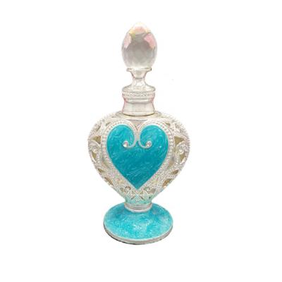 China Unique High Qiality 12ml High Qiality Heart Shape Perfume Tattoo Empty Pigment Bottle Empty Makeup Tools Refillable Glass Stick Essential Oil Bottle for sale