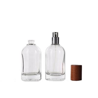 China High Sealed 50ML High End Empty Perfume Bottles Cylinder Bayonet Mouth Perfume Bottle Glass Perfume Bottle Packaging With Bamboo Wood Cap for sale