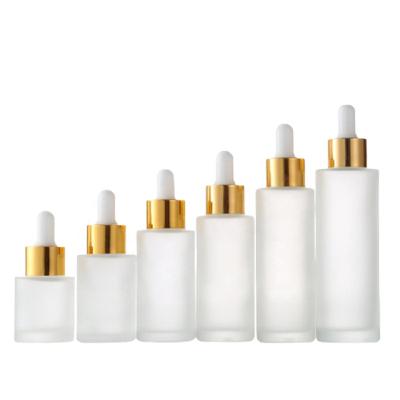 China Skin Care Packaging 20~100ml Personal Clear Frosted Glass Dropper Bottle Gold Lid Perfume Serum Dropper Packing Flat Shoulder Essential Oil Pipette Bottles for sale