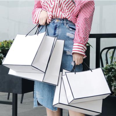 China Wholesale Custom Handled Printed Logo White Brown Kraft Gift Craft Paper Shopping Bag With Ribbon Handles for sale