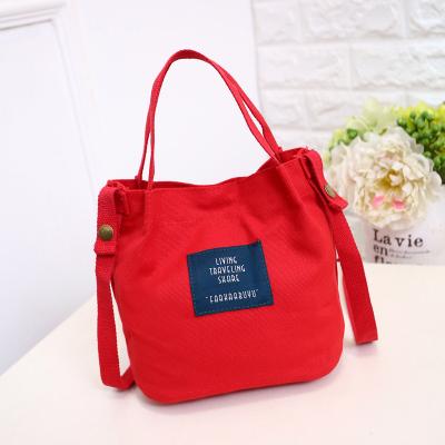 China Fashion Travel Portable Outdoor Drawstring Canvas Waterproof Handbag for sale