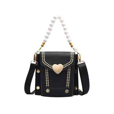 China 2021 trend rivet texture simple wide shoulder messenger bag small square mobile phone crossbody bag for sale