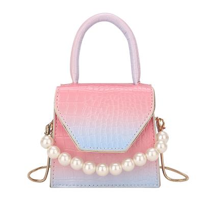 China Fashion Girl Pearl Chain Stone Pattern Water Proof Fancy Handbag for sale