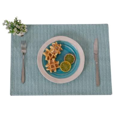 China New Modern Design Handmade Braided Green PVC Table Place Mat Office Customized Place Mat for sale