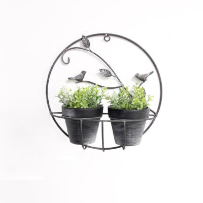 China Modern Forged Metal Circle Design Wall Hanging 2 PC Flower Plant Pot Rack for sale