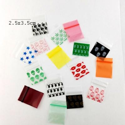 China Barrier Grass 100 Pcs/lot 2.5 * 3.5cm Small Clear Printed Ziplock Bags Mini Baggies Plastic Resealable Magic Seal Bag for sale