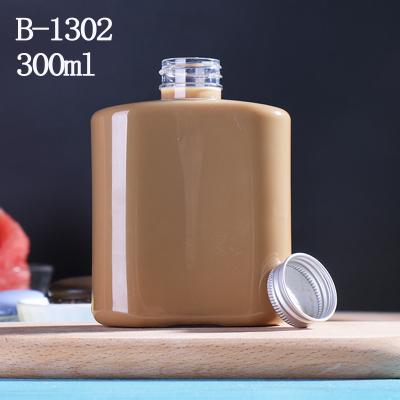 China food & Plastic Clear Beverage Packaging 300ml 10oz Food Grade Beverage PET Juice Flat Bottle With Aluminum Cap for sale