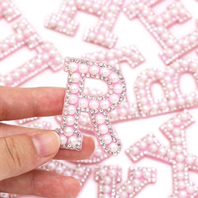 China Sustainable Pink A-Z Alphabet Designer Hot Fix Rhinestone Iron On/Sew On Jacket Patch Applique for sale