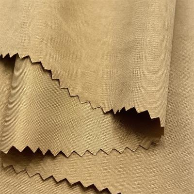 China 85% Polyester 15% Nylon Brushed Twill Peach Skin Beach Pants Fabric for sale