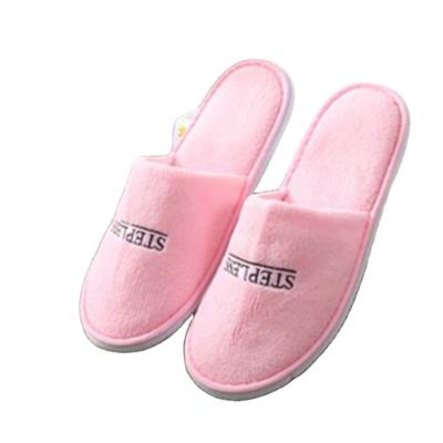 China Lightweight Customizable Female Coral Fleece Slippers Female LOGO Spa Disposable Washable Warm Five Star Slippers for sale