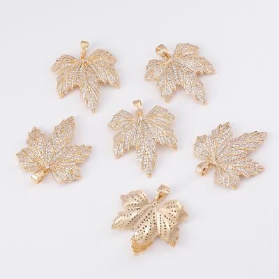 China Environmental Friendly 18k Gold Plated Brass Pendants Micro Inlaid Zircon Pendants Personalized Leaf Shape Pendant for sale