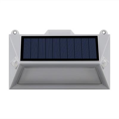 China Hot Selling Outdoor Waterproof Solar LED Wall Light Smart Stairs Light with Dual Motion Sensor Heads for sale